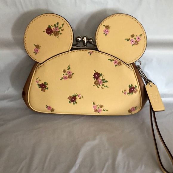 Coach Handbags - Disney for Coach yellow w/ flowers Mickey clutch